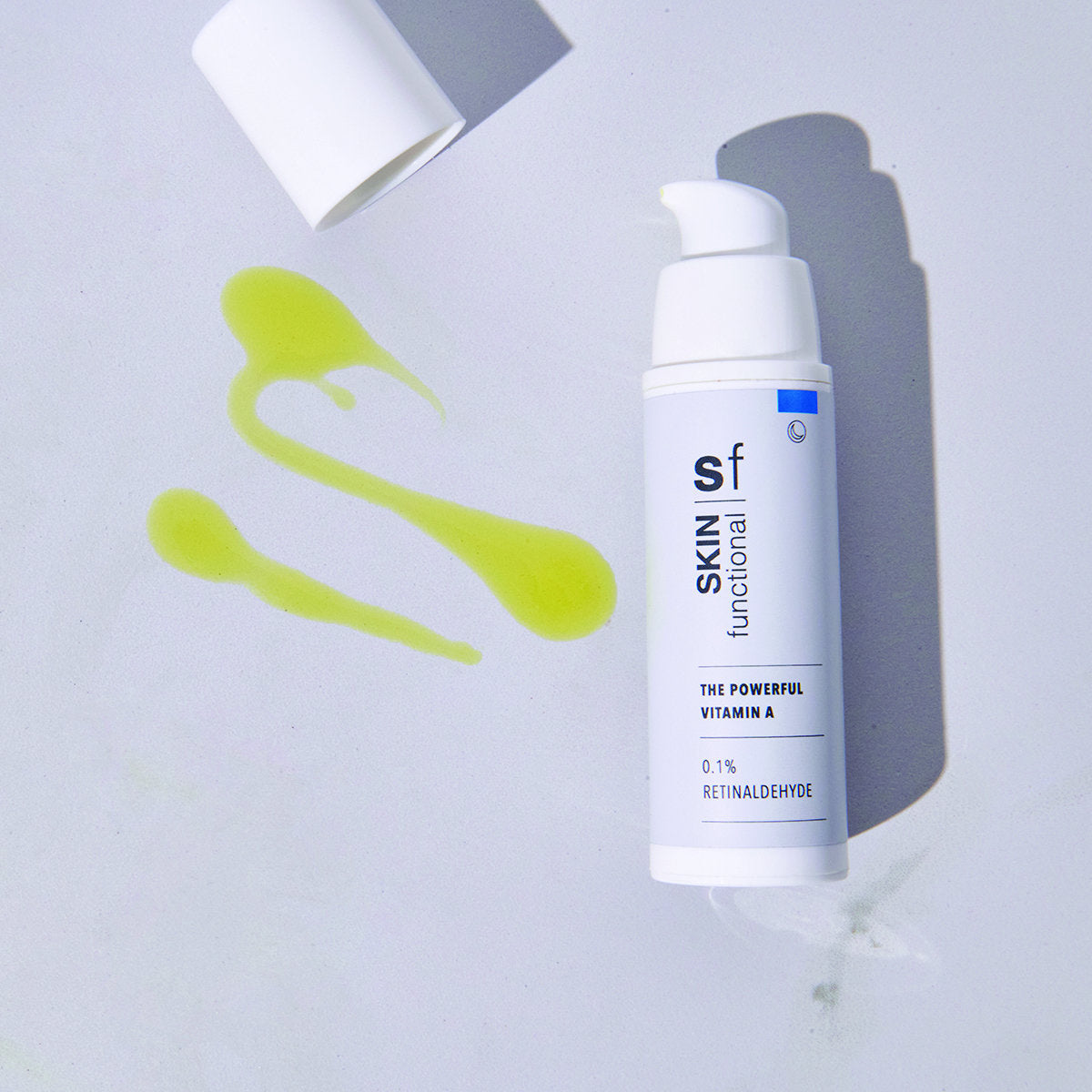 0,1% Retinaldehyde Serum Skincare bottle labeled 'sf skin functional' on a light gray background