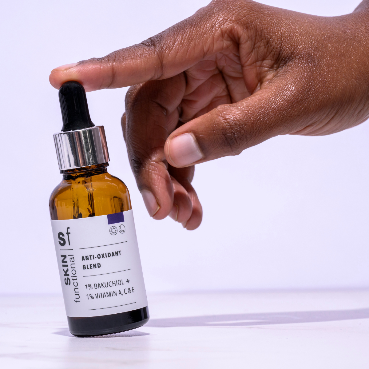 Skin Functional Anti-Oxident Blend Skincare product bottle with packaging and background