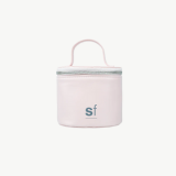 Small pink Skin Functional cylindrical container with a handle on a white background