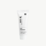 White tube of skincare product on a white background