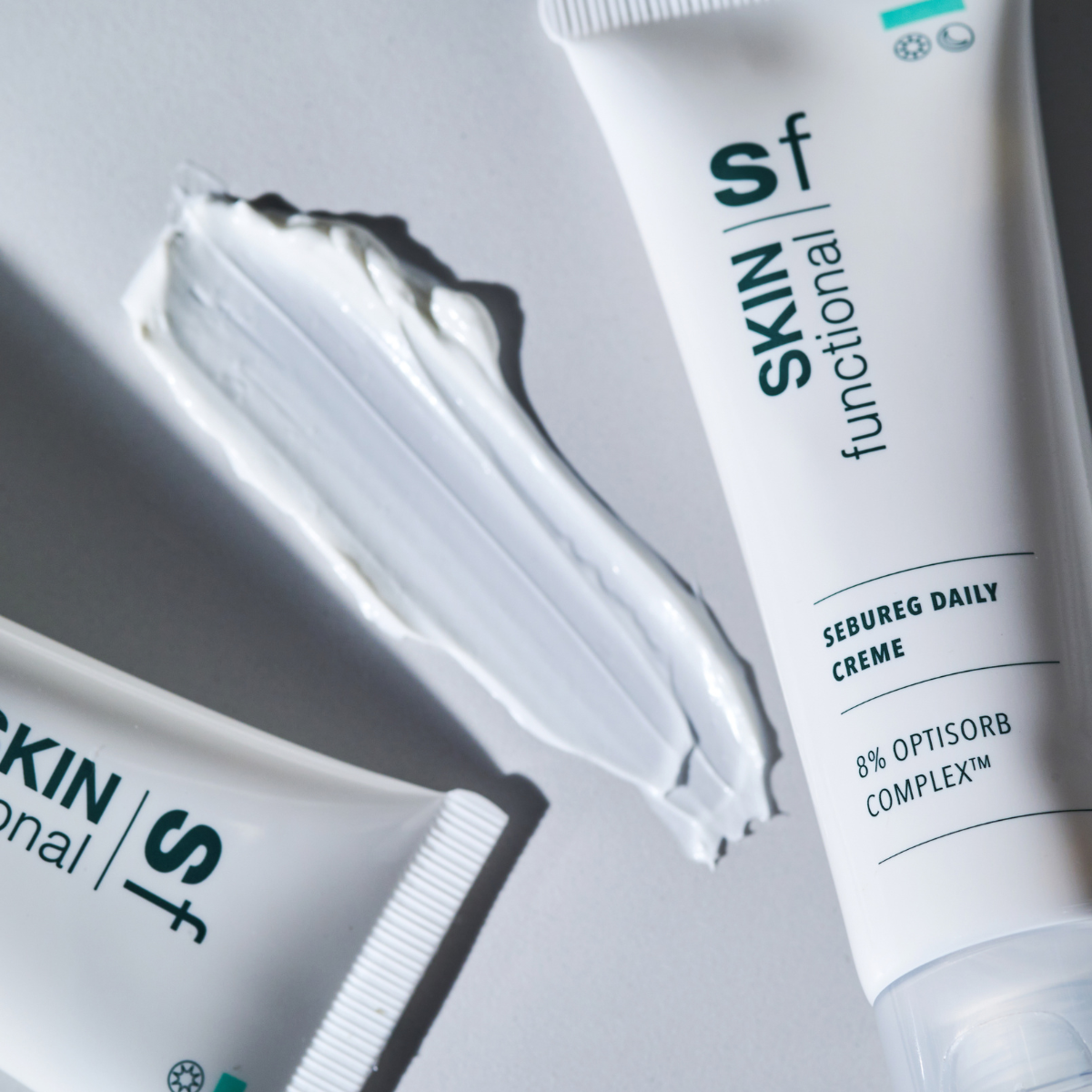 SKIN Functional Sebureg Daily Creme with product details skincare product on a light gray background