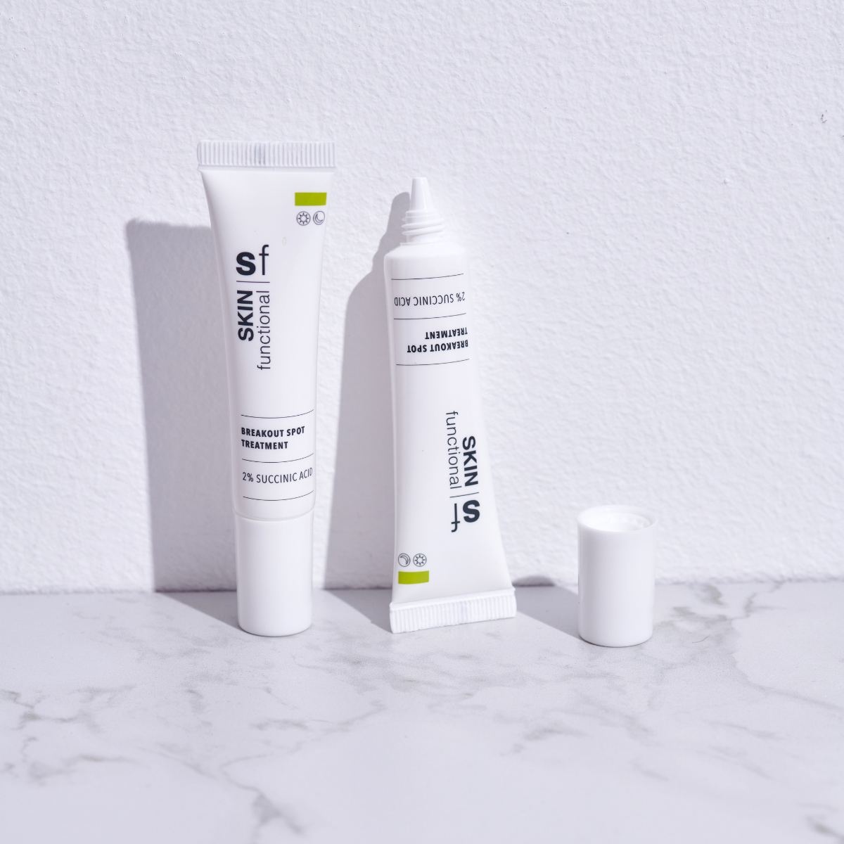 SKIN Functional Breakout Spot Treatment with product details skincare product on a light gray background