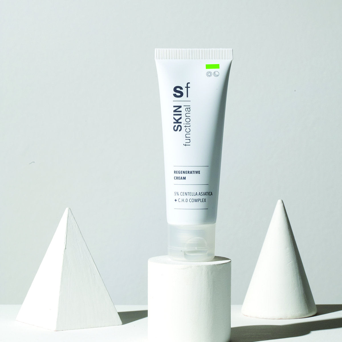SKIN Functional Regenerative Cream with details skincare product on a light gray background